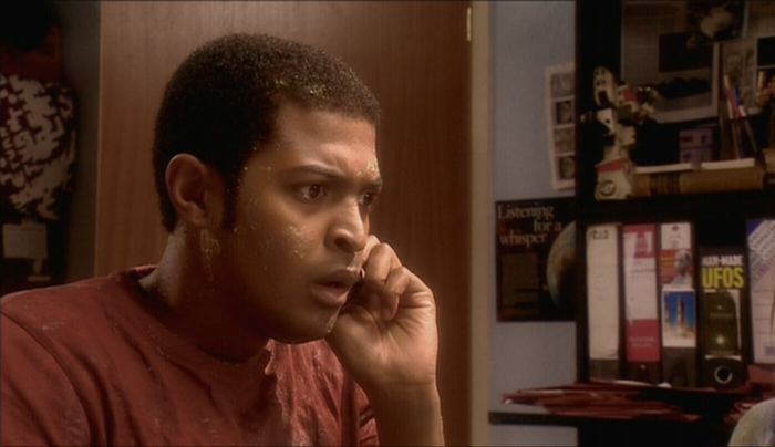 Mickey pretends to hack into UNIT, while Doc feeds him the one single password that constitutes all he has to punch in.