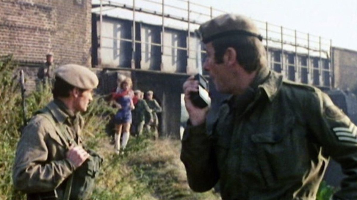 benton-on-the-radio-and-cowgirl-jo-in-the-background-day-of-the-daleks-doctor-who-back-when