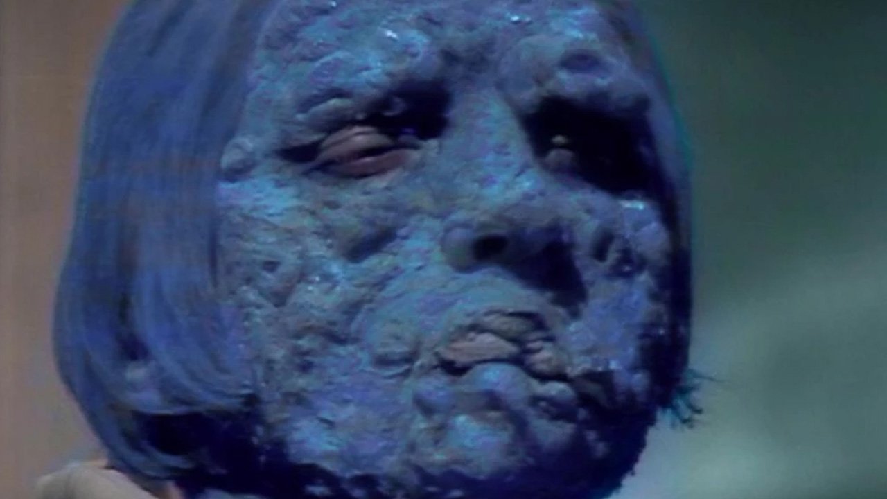 blue-alien-with-his-helmet-off-ambassadors-of-death-doctor-who-back-when