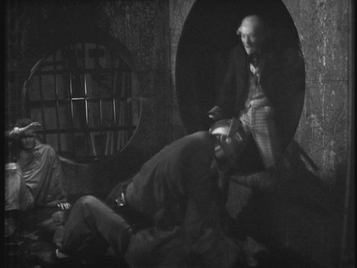 Doc bludgeons a Roboman