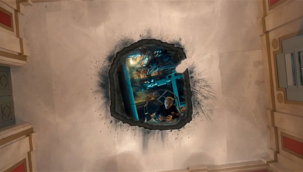 capaldi-looking-up-from-hold-in-floor-after-dimensional-shift-bomb-time-heist-doctor-who-back-when