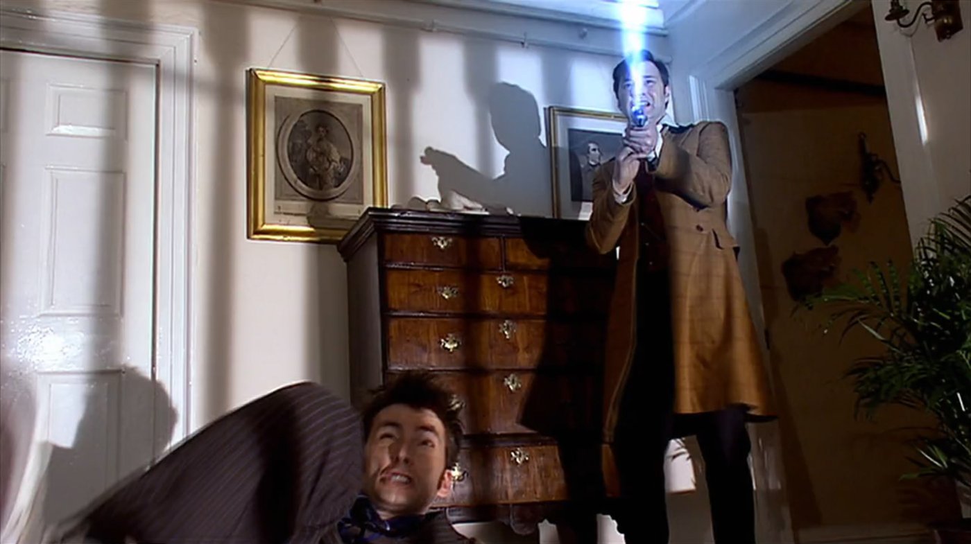 david-tennant-and-morissey-shooting-info-stamp-laser-at-cybermen-the-next-doctor-who-back-when