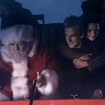Clara hugs Doctor in Santa's sleigh
