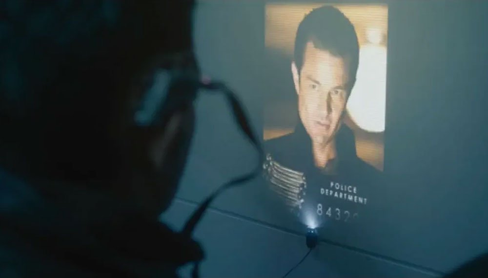 psi-looks-at-image-of-mugshot-captain-john-hart-spike-from-buffy-time-heist-doctor-who-back-when