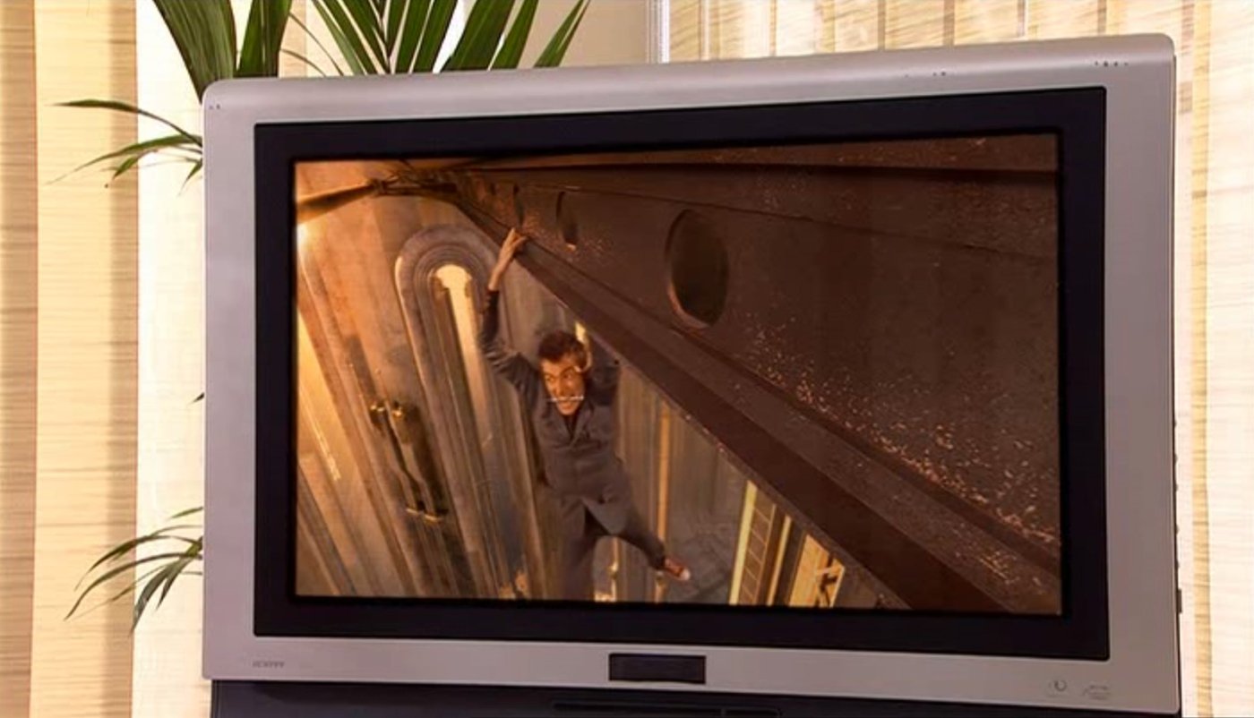 tennant-dangling-in-action-scene-on-cal's-tv-forest-of-the-dead-doctor-who-back-when