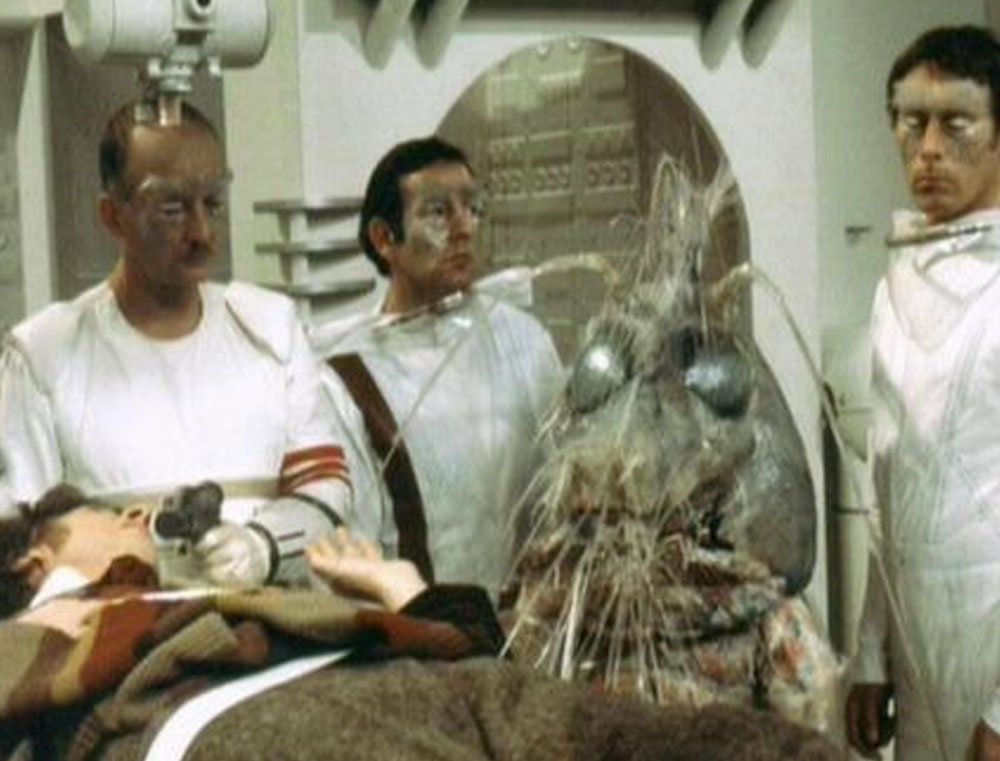 the-nucleus-lowe-and-henchmen-next-to-the-doc-invisible-enemy-doctor-who-back-when