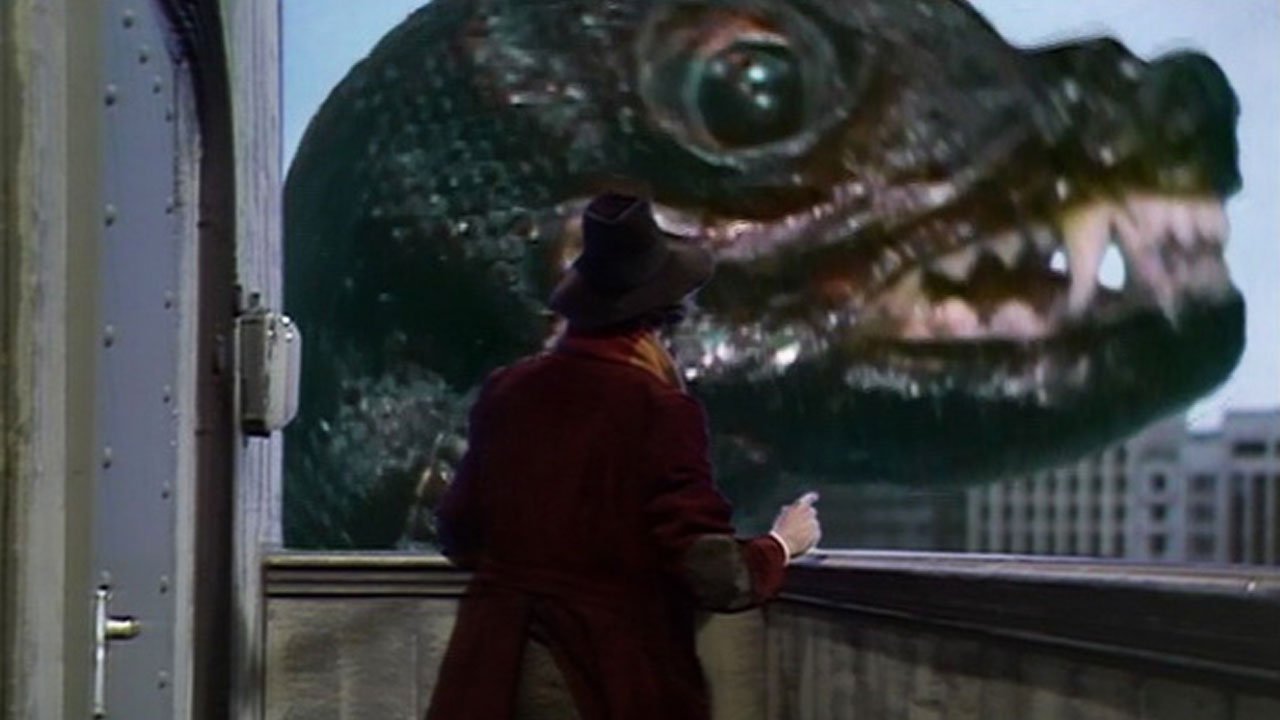 tom-baker-fourth-doc-throws-tracking-device-at-nessie-skarasen-in-the-thames-terror-of-the-zygons-doctor-who-back-when