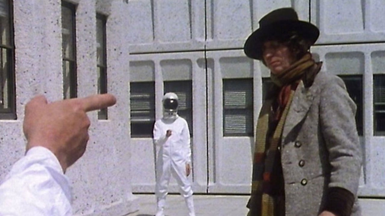 tom-baker-fourth-doctor-surrounded-by-astronaut-finger-blasters-android-invasion-john-doctor-who-back-when