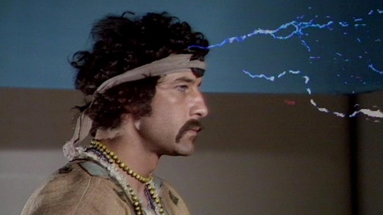 two-legs-hippie-with-metebelis-3-crystal-on-his-forehead-withstands-lightning-planet-of-the-spiders-doctor-who-back-when