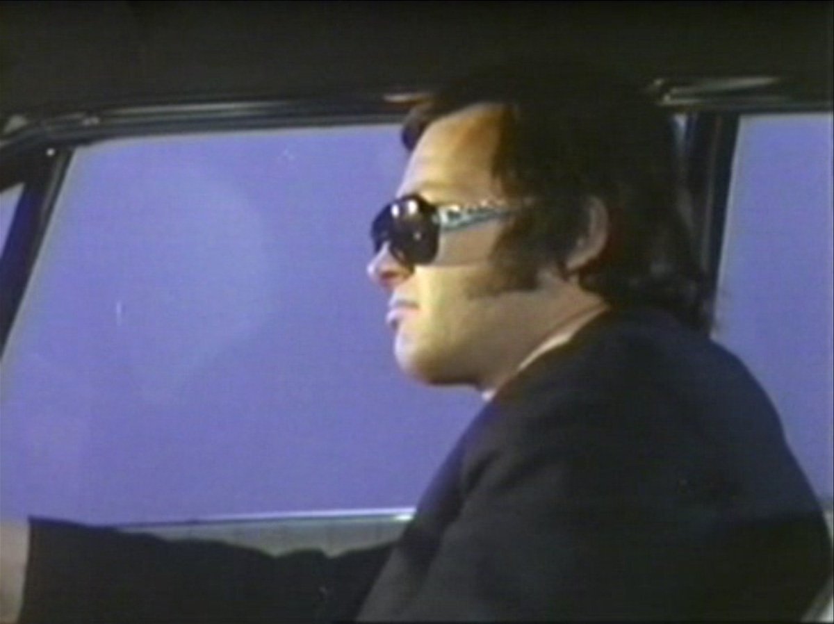 west-country-elvis-in-incompletely-blue-screened-car-claws-of-axos-who-back-when